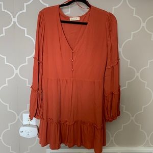 Burnt orange ruffle sleeve dress. Bought from Dressup